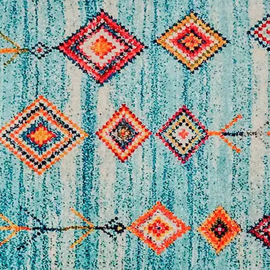 Gros plan sur le velours du tapis berbère coloré numidya