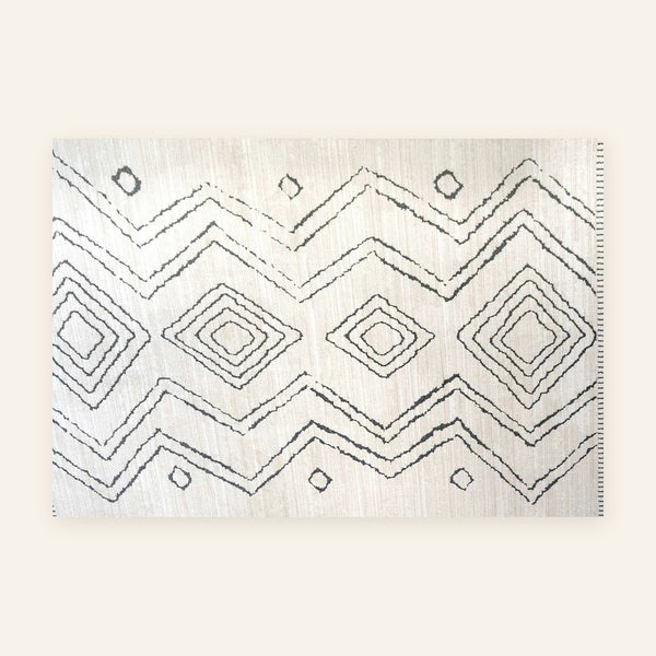 Tapis Beni Ouarain Silya, écru à zigzags encre, vu à plat